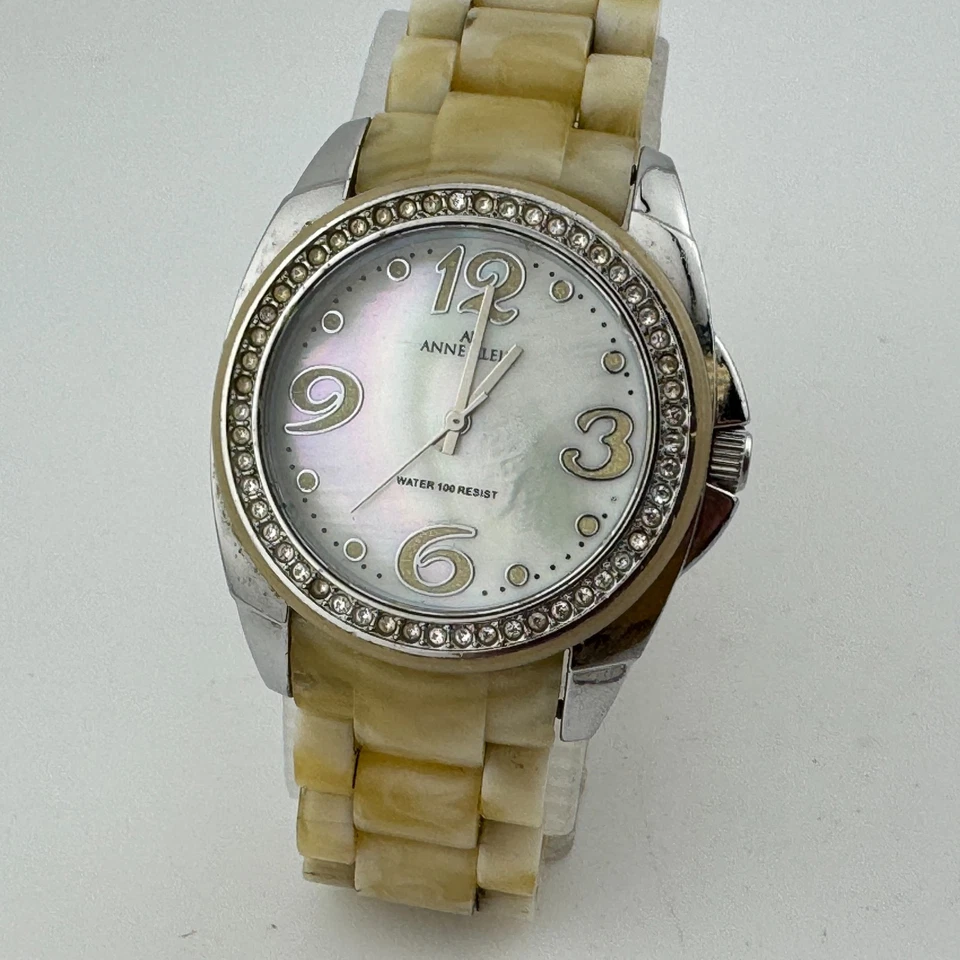 Reloj de Cuarzo Anne Klein 10/9295 Unisex Tono Dorado MOP Imitación Mármol Batería Nueva 7" Foto 2 de 4