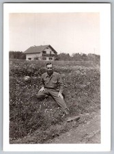 Vtg B W Snapshot Soldier Man In WW2 Military Uniform Sitting In Field 1940s