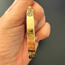 9ct gold hallmarked ladies gold bangle with opening.
