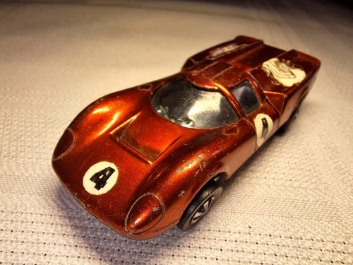 Vintage Hot Wheels Redline Lola GT 70 in Spectraflame red 1968 Mattel