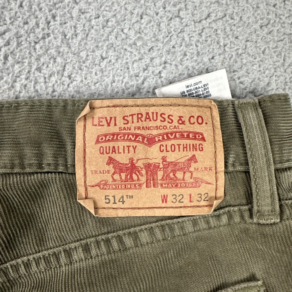 Pantalones chinos informales Levi's 514 ajustados rectos de pana para hombre 32x32 marrón blanco lengüeta Foto 2 de 4