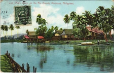 PC PHILIPPINES, MORO VILLAGE ON THE RIO GRANDE, Vintage Postcard (b42886)
