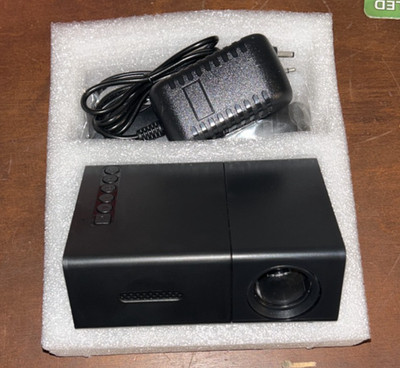 Mini LED Projector. Brand New In The Box. W/ Remote Controller Bundle