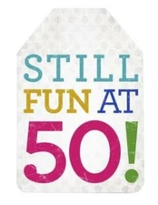 About Face Designs Still Fun at 50 Metal Tag