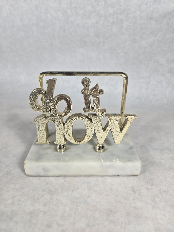 A 1970s marble-and-brass 'Do It Now' letter holder that turns a productivity mantra into a stylish desk sculpture.