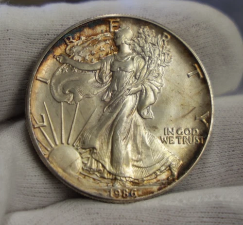 1986 US Silver Eagle $1 Nice Unc Key Date (Toned)