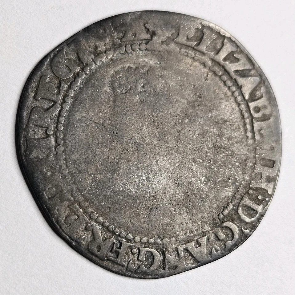 Moeda martelada Elizabeth I (1º) xelim 1s prata 2ª edição 1560 a 1561 - Imagem 2 de 4