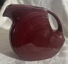 #484102  CINNABAR POTTERY FESTIVAL DISK PITCHER 87 Oz.  Never Used.