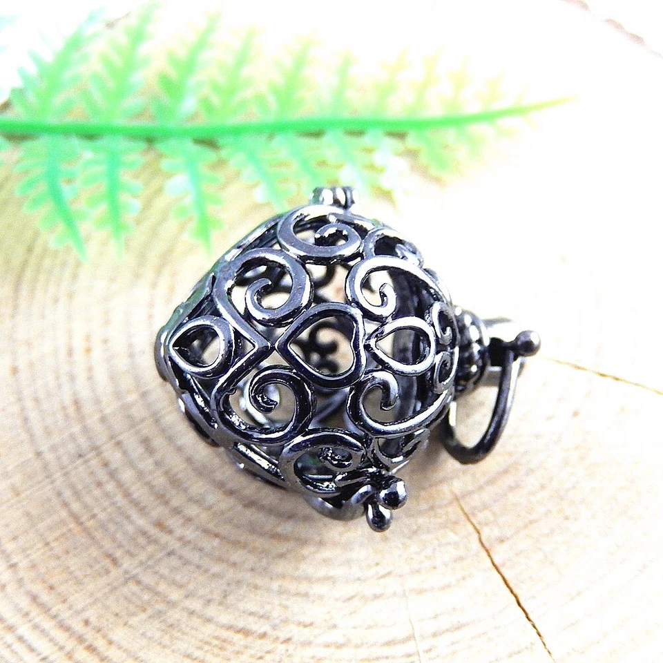 2 PIEZAS Medallón Colgante Corazón Floral Huecado Negro Bola Mexicana Dije Llamador Ángel Foto 3 de 4