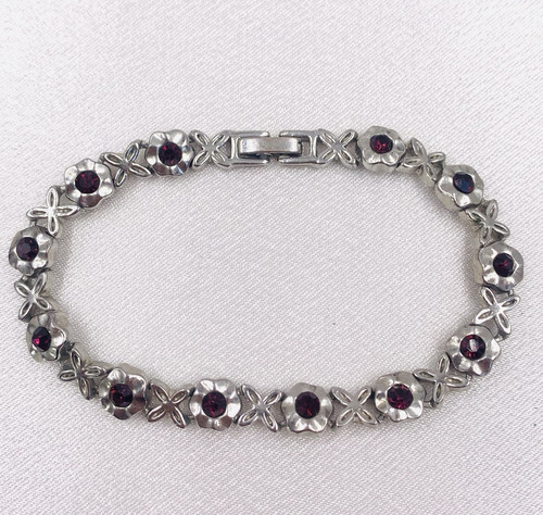 Sehr schönes Armband Florales Design mit lila Steinen 18 cm lang Silberfarben