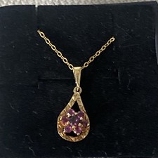 ruby cluster 9ct gold pendant