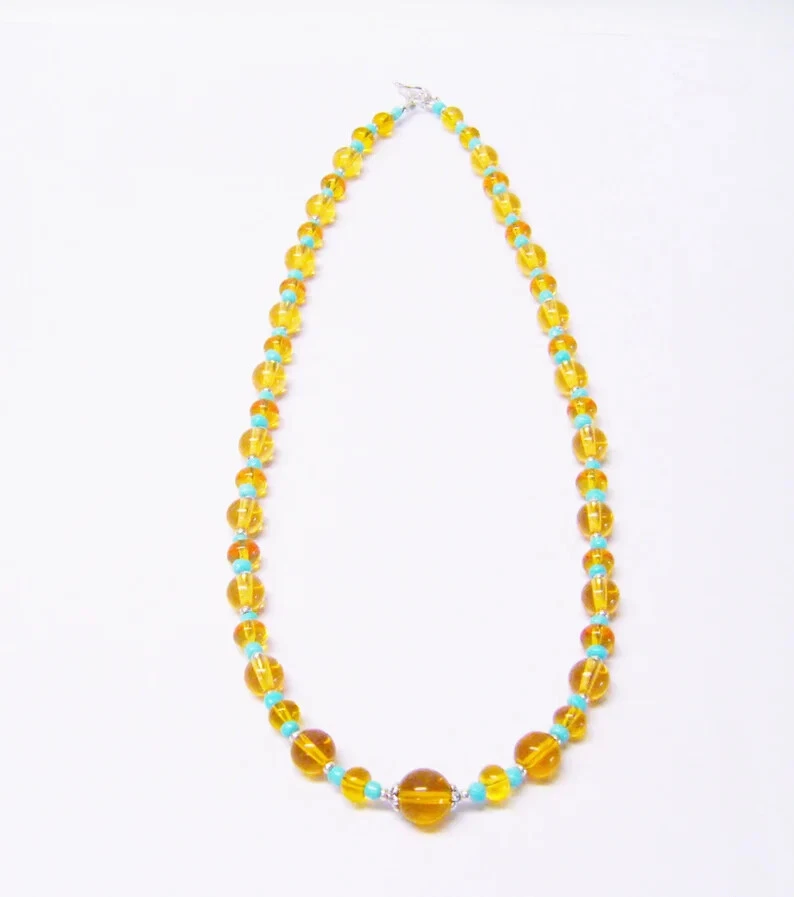 Collar/pulsera/pendientes redondos de resina naranja claro con cuentas electrónicas de vidrio turquesa Se Foto 3 de 4