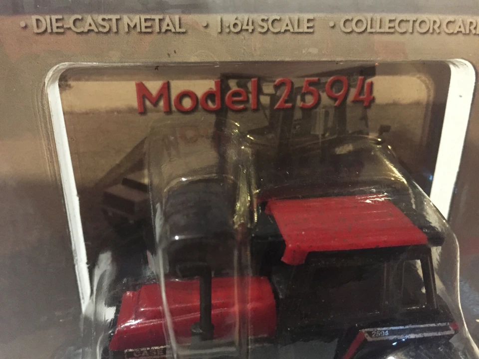 Tractor Premier Case/IH 2594 ultra raro serie Muddy nuevo en paquete escala 1/64 de Ertl Foto 2 de 4