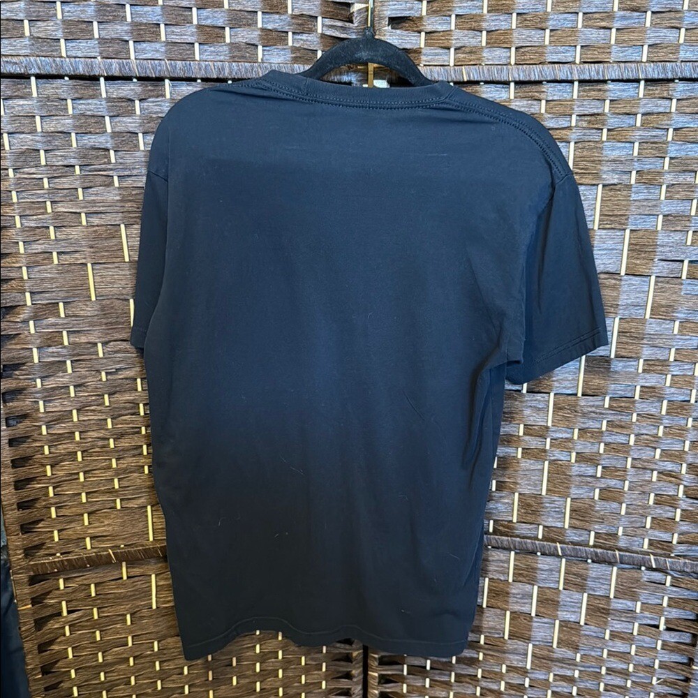 T shirt Salomon nera manica corta con disegno grafico