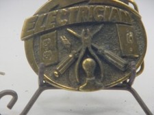 NICE VINTAGE 1981 ELECTRICIAN BELT BUCKLE GREAT AMERICAN PRODUCTS PEWTER