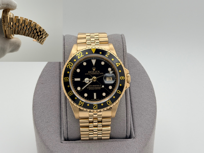 ジョージ Rolex GMT Master II 16718 40mm Black Dial 18k Yellow Gold Jubilee