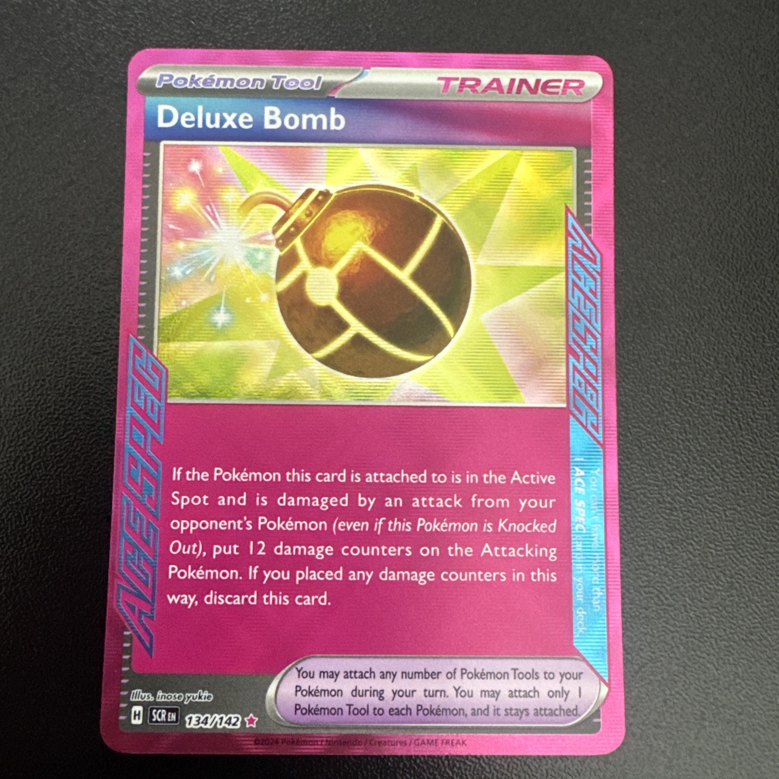 Deluxe Bomb 134/142 Holo SV: Stellar Crown Ace Spec Rare Pokemon TCG NM 2024