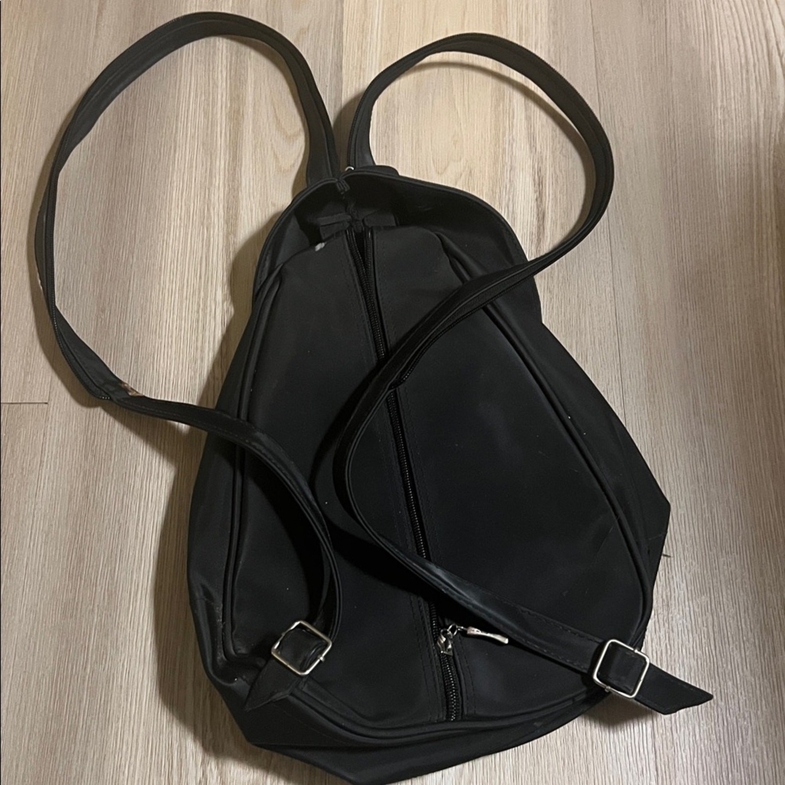 Nylon black backpack zip transforms into one stra… - image 4