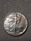 1942 Walking Liberty Half Dollar In VF TO EF  CONDITION In My Opinion. #409