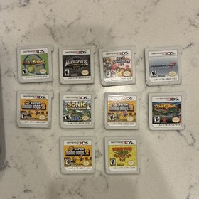 Nintendo 3DS XL US Console with charger, case, and games. OPEN TO OFFERS