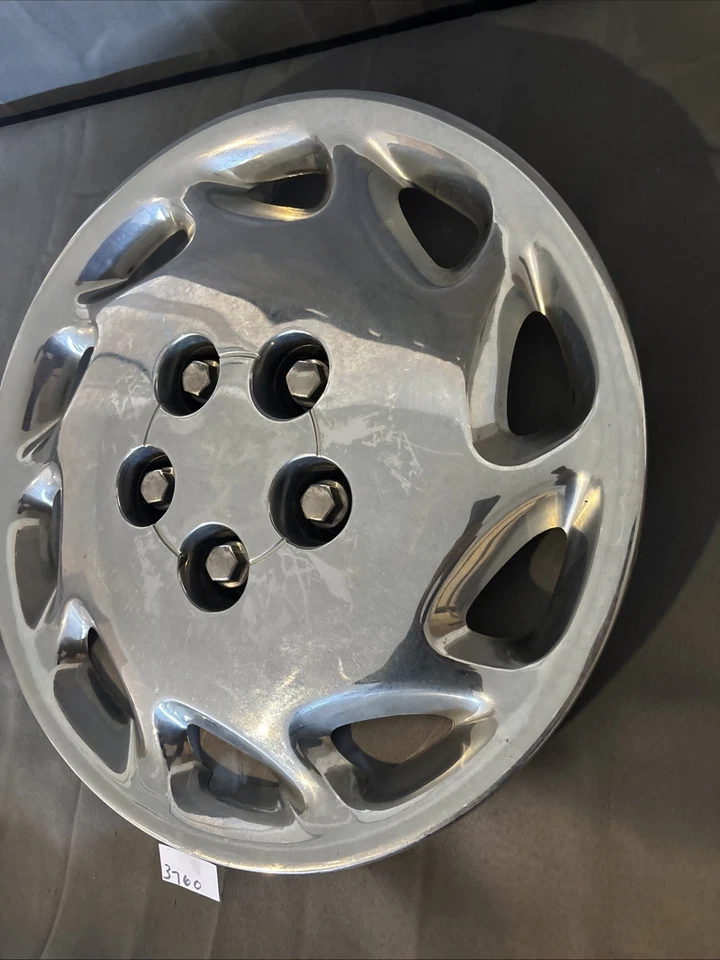 '97-'99 OLDSMOBILE CUTLASS SUPREME, TAPACUBOS USADO 15", CROMO, 10 RADIOS, 4126 Foto 4 de 4