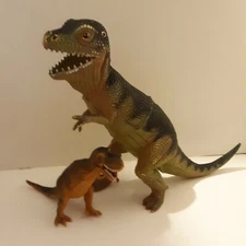 Lot of 2 Tyrannosaurus Rex Plastic 10 1/2" Tall 4 1/2" Tall small is Dolgen