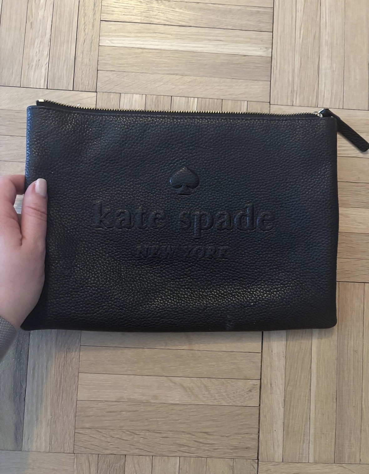 Kate Spade New York Black Pebbled Women's pouch with  Embossed Logo