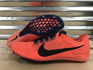 nike orange spikes