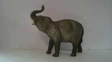 Vintage Realistic Looking Elephant with Trunk Up