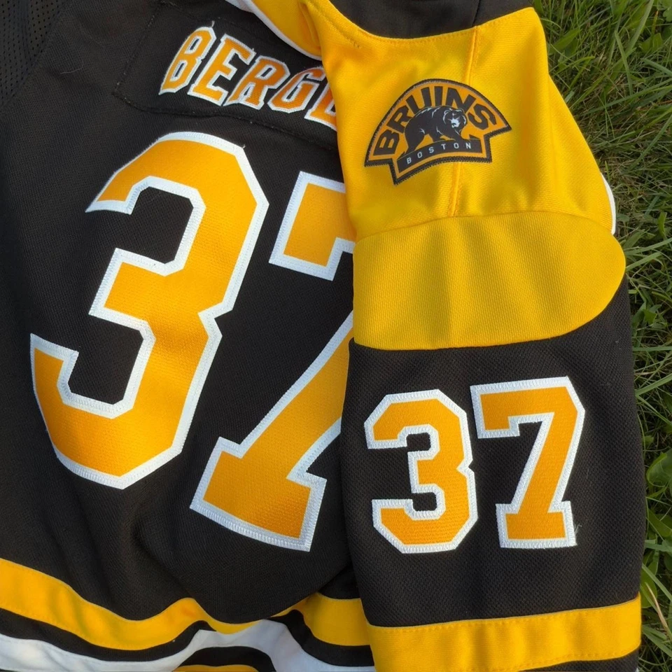 Camiseta deportiva Patrice Bergeron Boston Bruins réplica local juvenil jugador - talla L/XL Foto 4 de 4