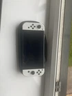 Nintendo Switch OLED Model HEG-001 Handheld Console 64GB White with Case