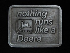 NG11151 NOS VINTAGE 1975  NOTHING RUNS LIKE A DEERE  TRACTOR PEWTER BUCKLE