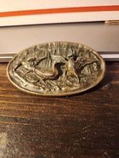 Brass belt buckle flying ducks