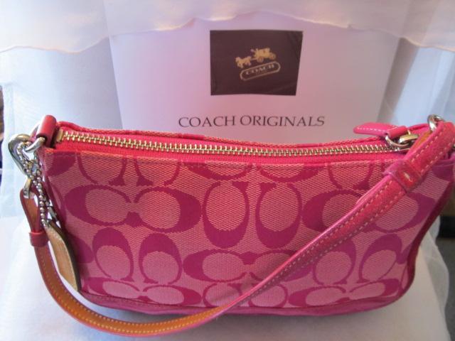 coach bag with pink trim
