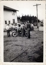 WW2 Photo of Soldier Posing Playfully by Barracks