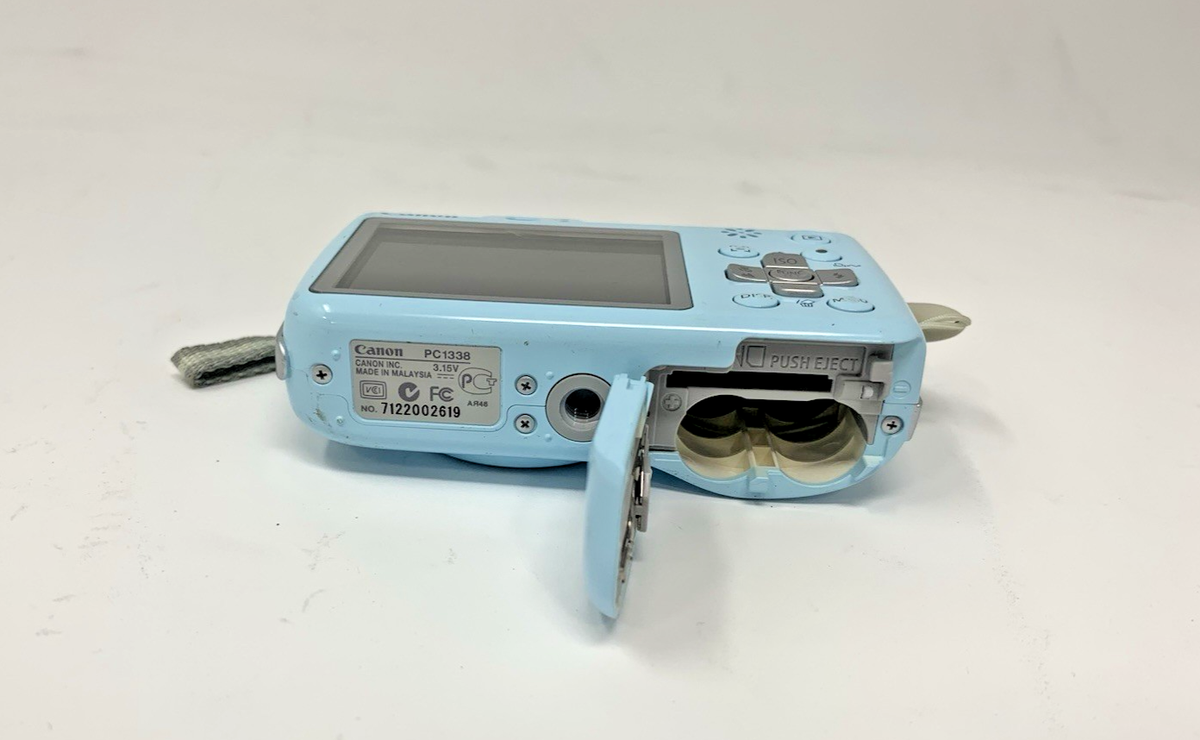 Canon PowerShot E1 PC1338 4x Opti Zoom IS 10MP Blue Digital Cam