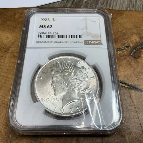 Peace Silver Dollar (1923-P) GRADED NGC MS62 #8684195-126  (90% Silver)