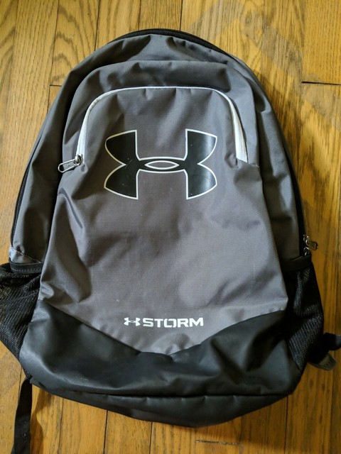 red and gray under armour backpack