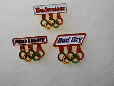 set of 3 Olympic USA hat pins - Budweiser, Bud Light and Bud Dry beer