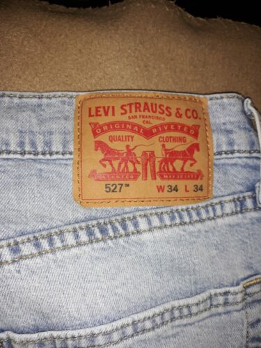 Levi's 527 Jeans Mens 34x34 Slim Bootcut 5-Pocket Stretch Flex Denim Light Blue.