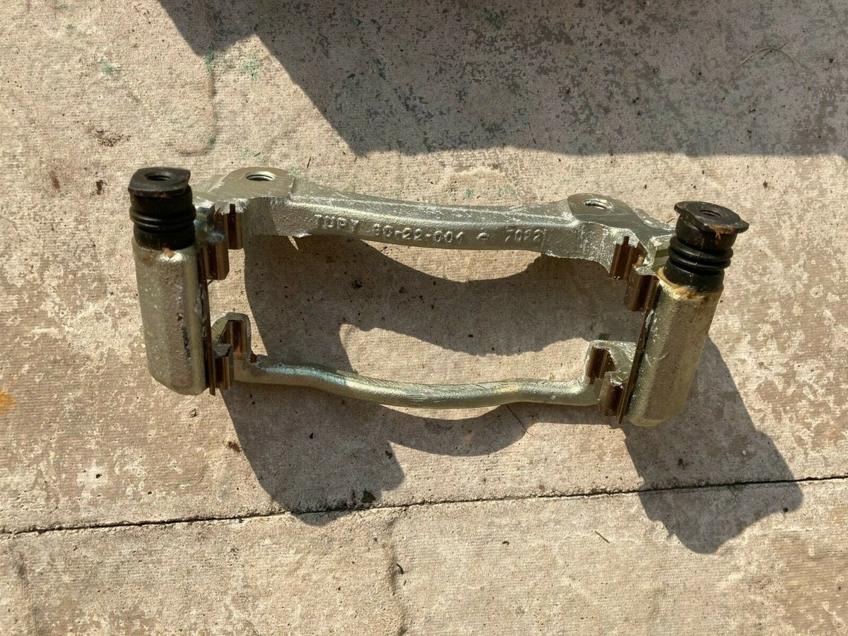 Ford Explorer Front Brake Caliper Carrier Genuine OEM 4687273 