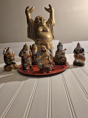 Characters: The set typically includes Hotei (abundance), Jurōjin...