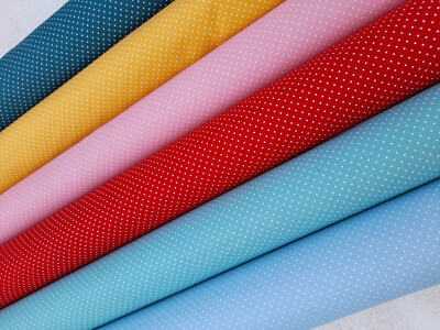 Beschichtete Baumwolle mit Pünktchen  50 x 148 cm Oeko-Tex zertifiziert