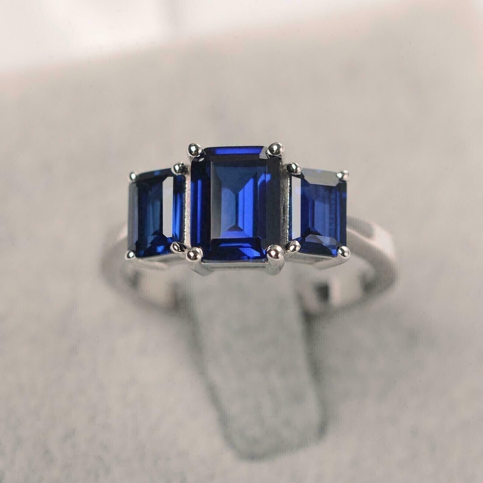2Ct Emerald-Cut Simulated Sapphire Engagement Ring in 14K White Gold Plated Silver
