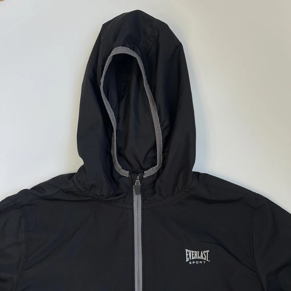 Chaqueta cortavientos Everlast Sport para niño talla X grande (14/16) negra con capucha cremallera Foto 2 de 4