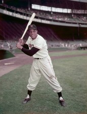 baseball player Willie Mays posing in a batting stance while weari- Old Photo