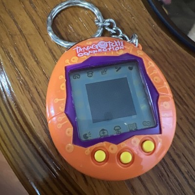 Tamagotchi Connection V1 2004 Orange + Purple trim - Tested 