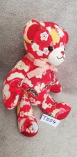 Peluche n°T554: OURSON en tissu (membres articulés) - 24cm