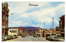 Main Street Durango Colorado Vintage Postcard CO MCM Cars Signage Texaco Conoco