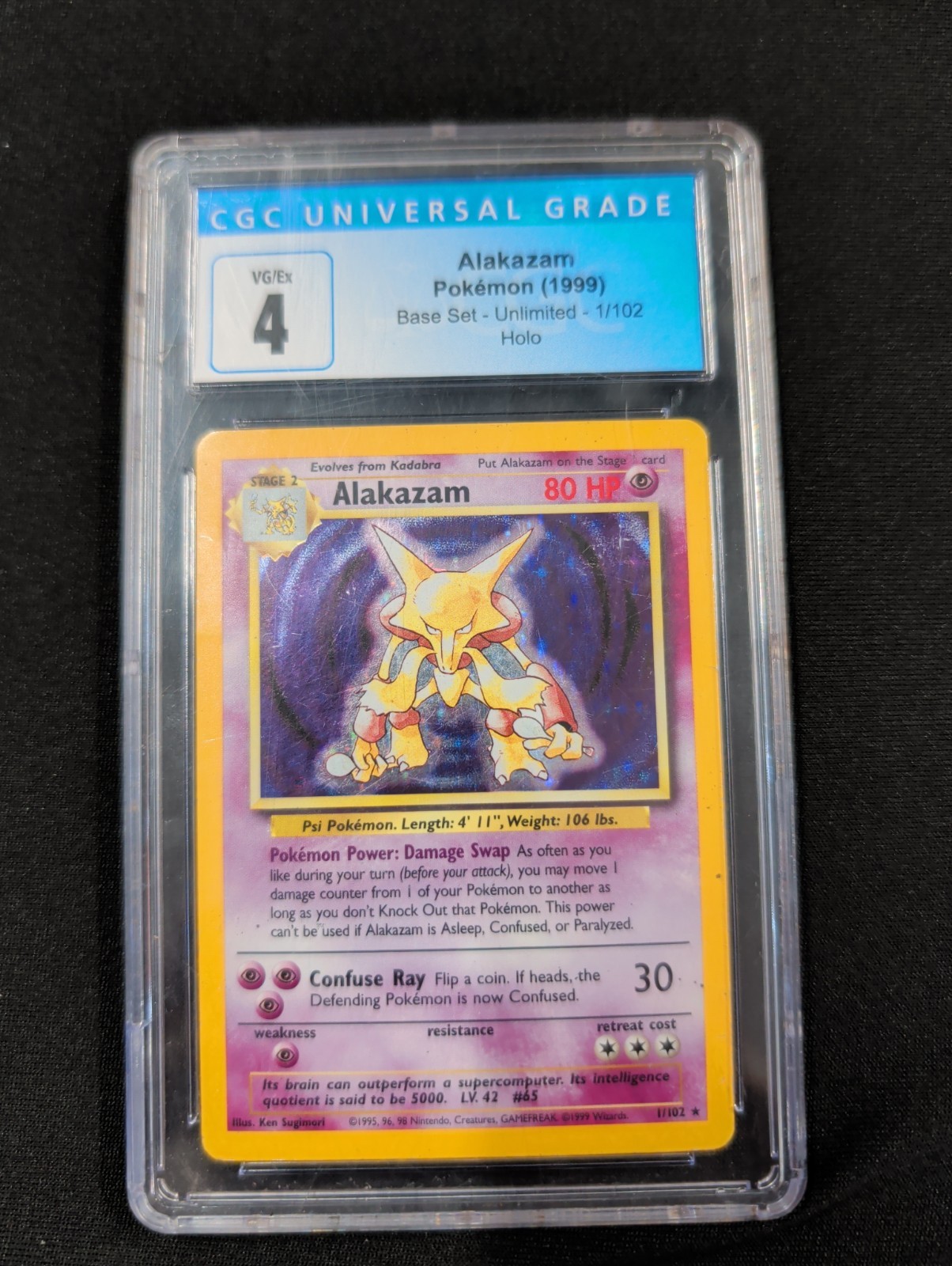 1999 POKEMON BASE SET - HOLO #1/102 ALAKAZAM CGC 4